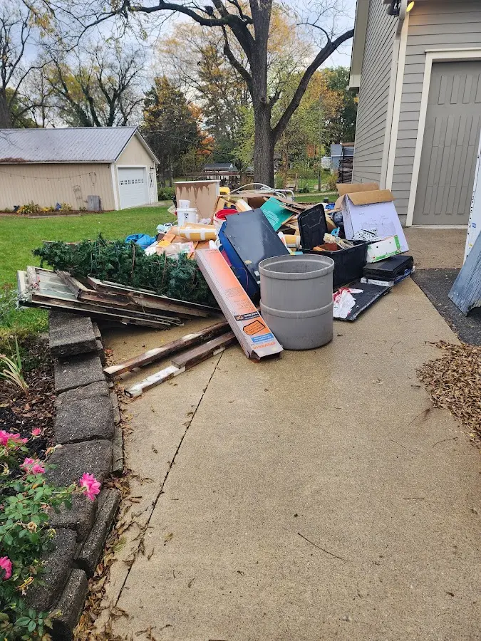 Dumpster being loaded with debris for 30 Yard Dumpster Rental in Mount Vernon